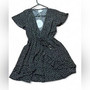 Princess Polly Bobbie mini dress in black with a white polka dot print.